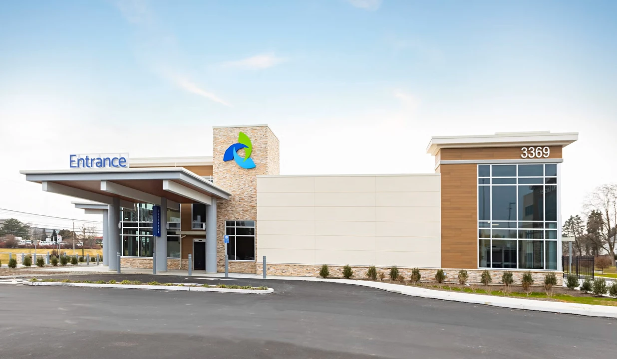 Modern medical facility with large glass windows and stone facade in Lehigh Valley Health Network