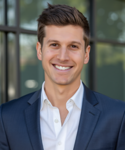 Headshot of Alec Abrams, Director