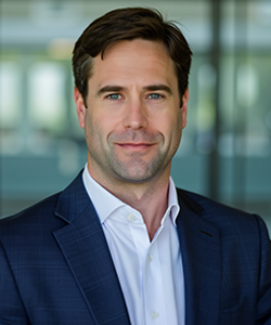 Headshot of Richard Small, Managing Director