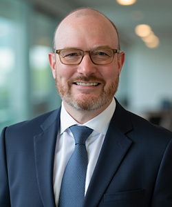 Headshot of Tim Mackey, Chief Investment Officer